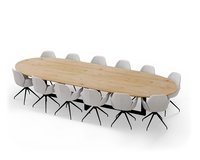 Op deze afbeelding is een vergadertafel te zien met een halve cirkel vorm. Het onderstel bestaat uit een metalen Louise met daaraan 12 vergaderstoelen.
